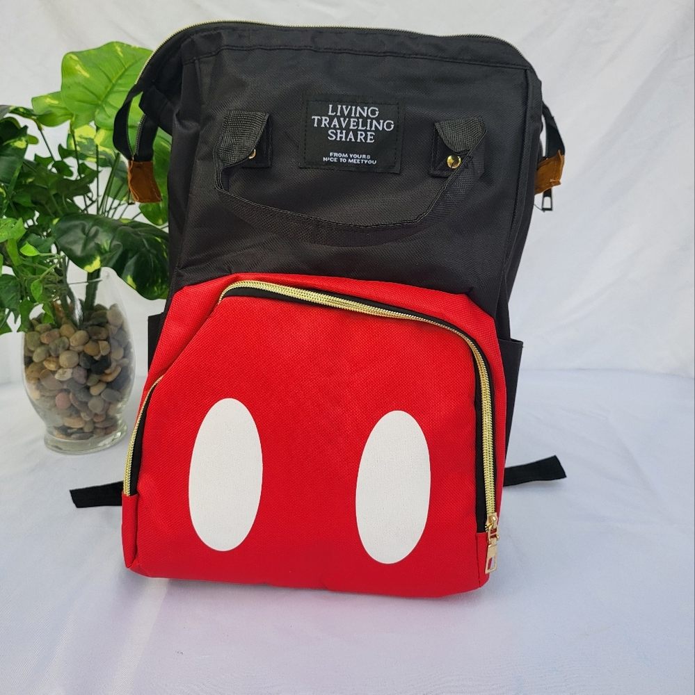 New without tags Mickey Mouse Backpack black and red. This is a medium size.